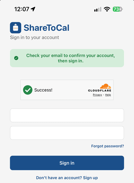 Sign in screen showing a 'check your email to confirm your account' banner